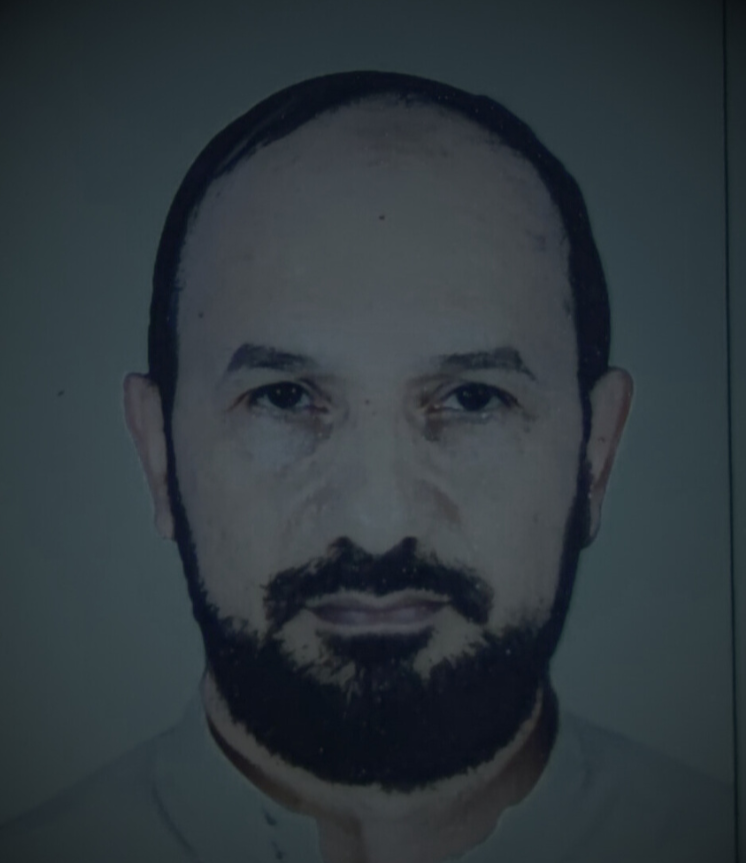 Professional headshot of Dr. Kamal Al-Atowi